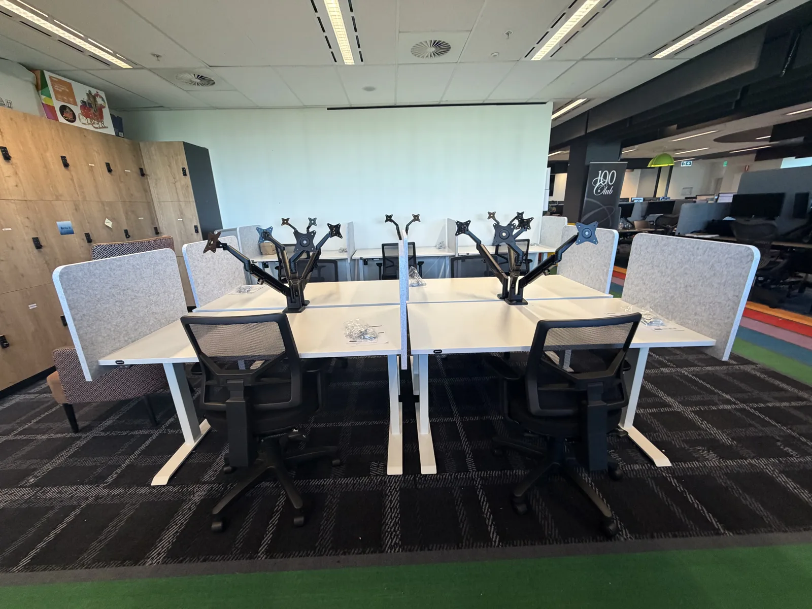 Shared office desks with fabric privacy screens